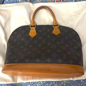 Louis Vuitton Alma PM in signature LV pattern. Dust bag NOT included.